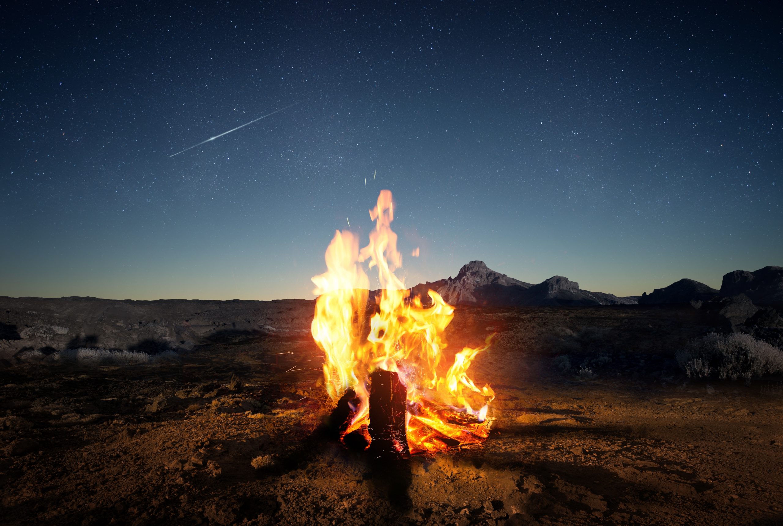 Exploring,The,Wilderness,In,Summer.,A,Glowing,Camp,Fire,At