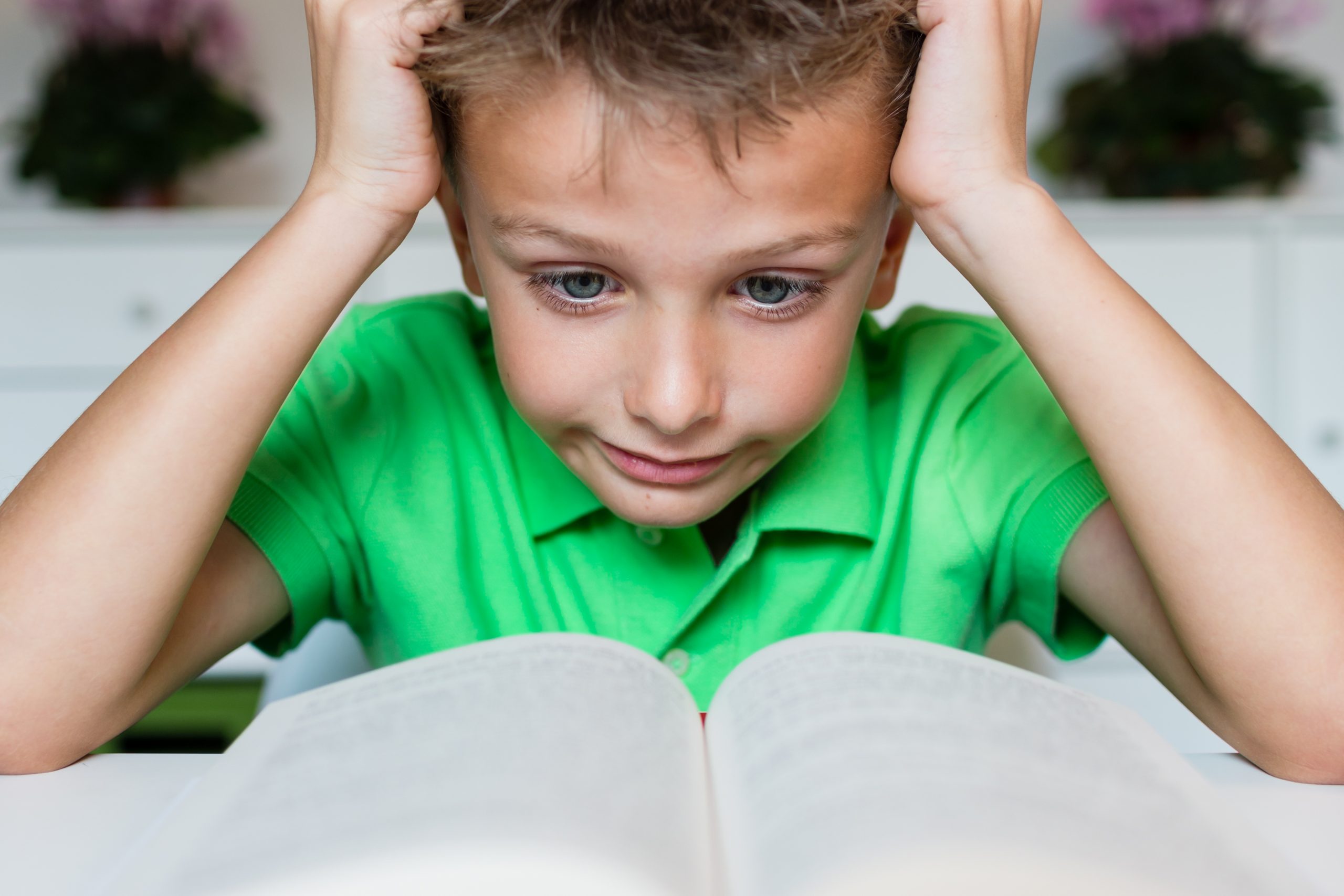 Young,Boy,In,Green,Polo,Shirt,Having,Serious,Learning,Difficulties