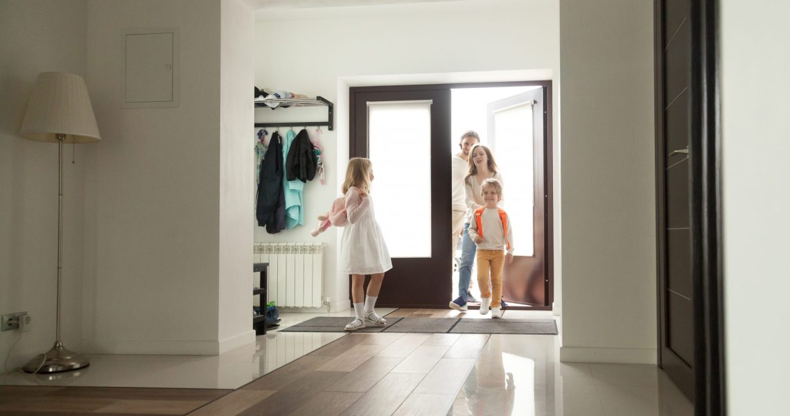 Kids,Coming,Back,Home,With,Parents,Mom,And,Dad,,Smiling