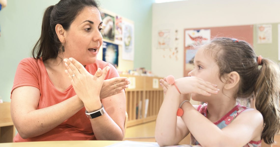 Sign,Language,Teacher,In,A,Extra,Tutoring,Class,With,A