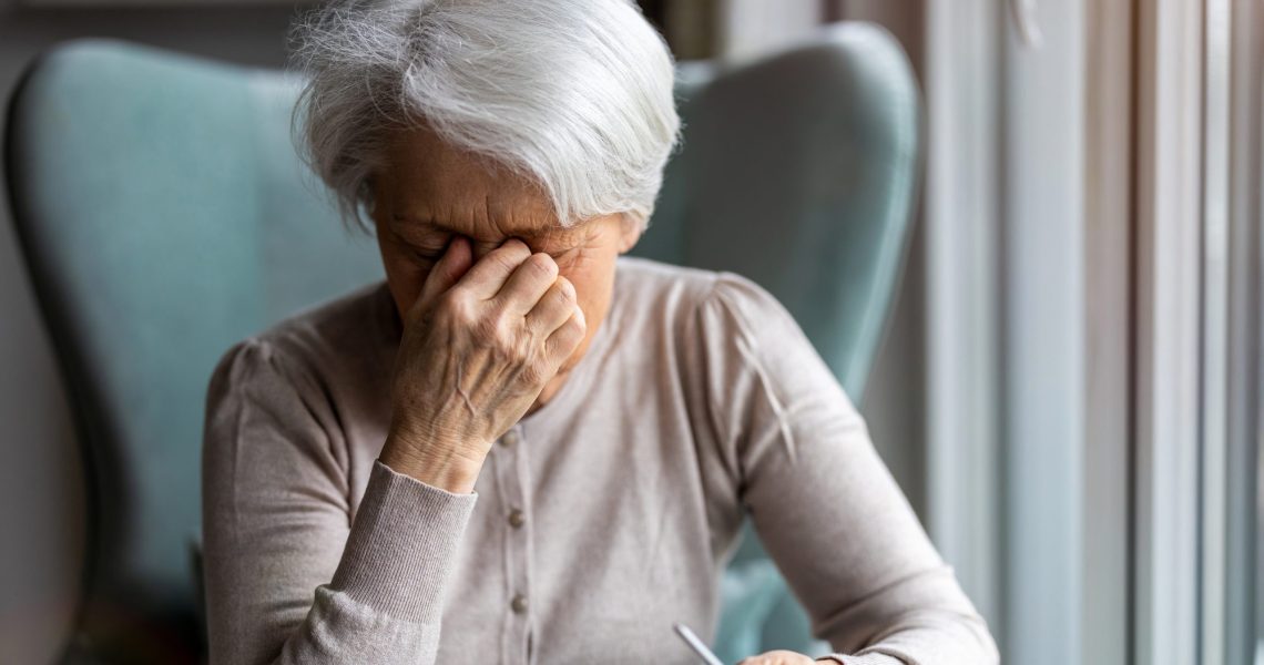 Senior,Woman,Suffering,From,A,Headache