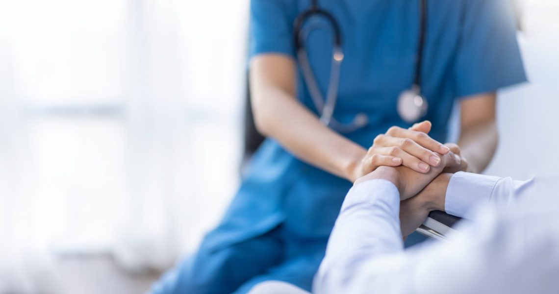 Cropped,Shot,Of,A,Female,Nurse,Hold,Her,Senior,Patient's