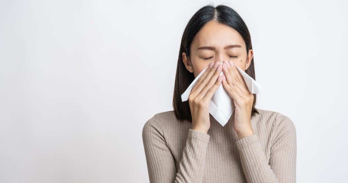 Portrait,Of,Beautiful,Young,Asian,Sick,Woman,Over,Isolated,White