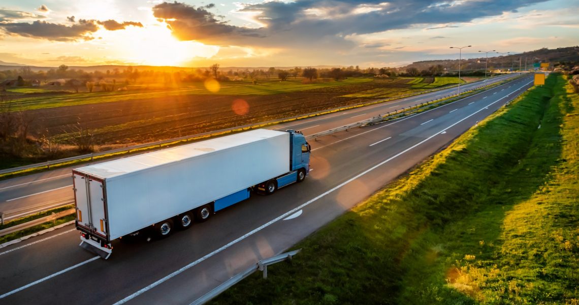 Large,Transportation,Truck,On,A,Highway,Road,Through,The,Countryside