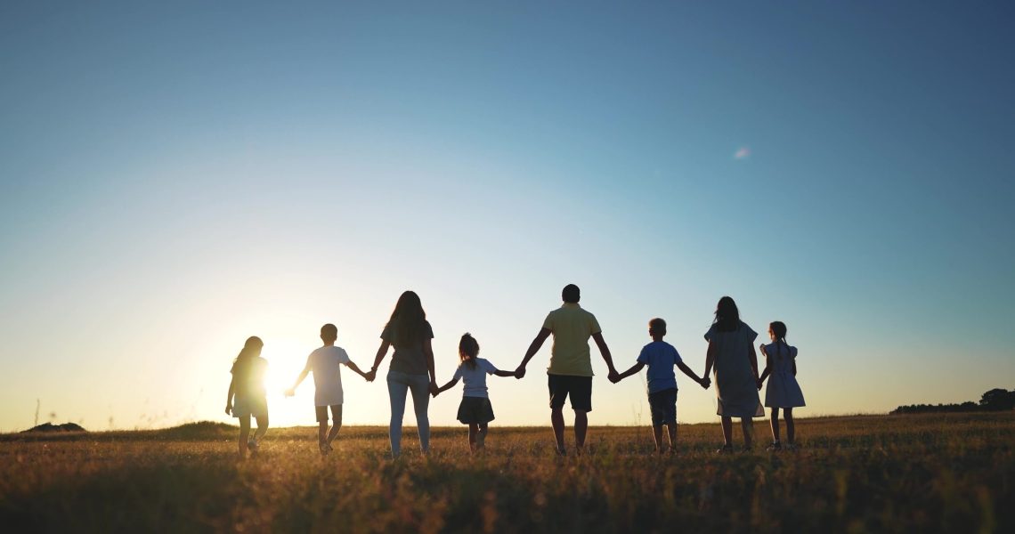 Big,Family.,Huge,Community,Family,Holding,Hands,Walking,In,The