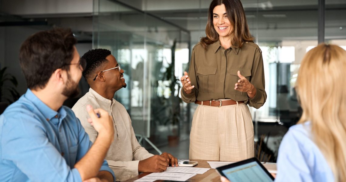 Happy,Middle,Aged,Business,Woman,Executive,Ceo,Leader,Discussing,Project