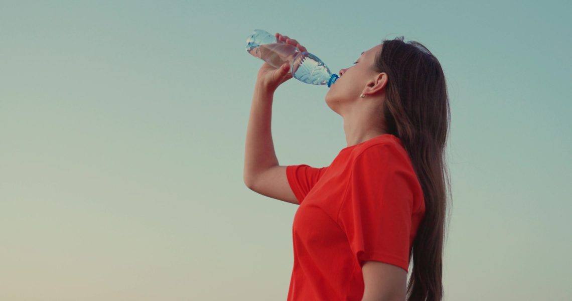 Outdoor,Sports,,Girl,Drinks,Clear,Mineral,Water,After,Training,At