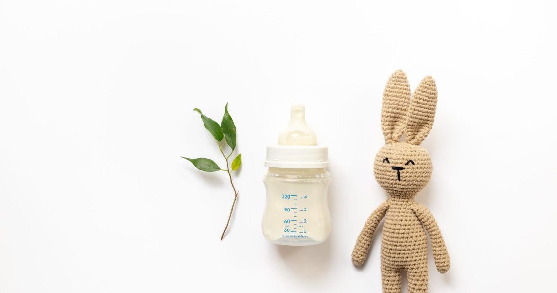 Feeding,Time,For,Baby.,Milk,In,Bottle,And,Toy,On